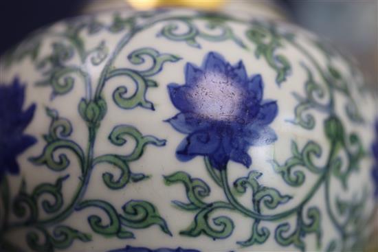 A rare Chinese doucai lotus flower jar, Wanli six character mark and probably of the period, (1573-1619), H. 9.5cm, D. 10.8cm, later